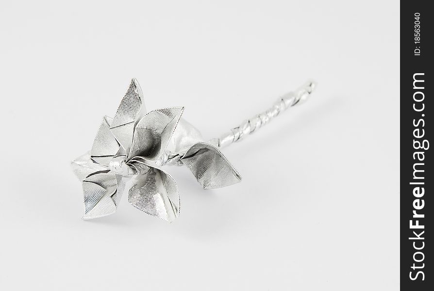 Beautiful flower origami made of silver paper