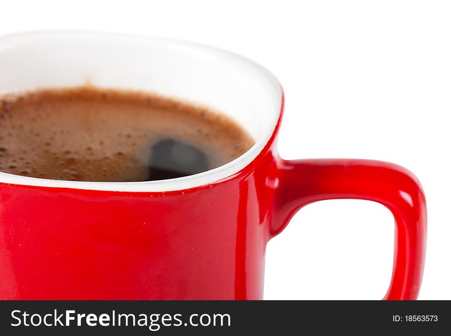 A red cup of coffee isolated over white background