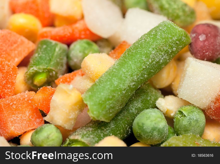 Background with colorful frozen vegetables