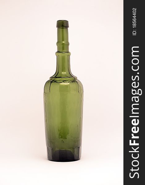 Old green wine bottle, kitchen. Old green wine bottle, kitchen.