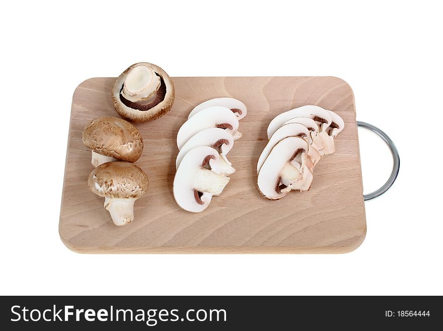 Fresh organic Mushrooms on a chopping board. Fresh organic Mushrooms on a chopping board