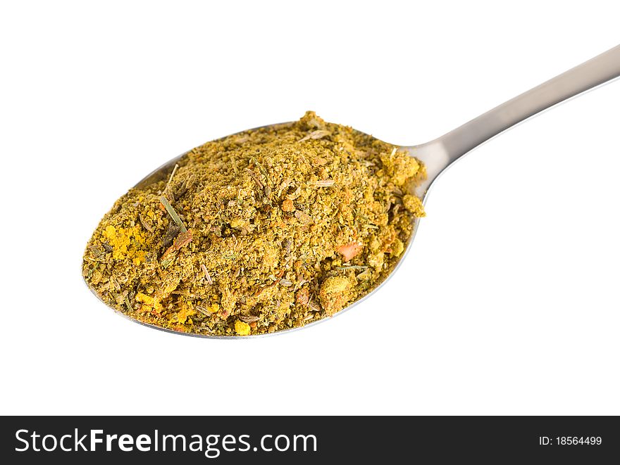 Crushed Asian spices in a spoon isolated on white background