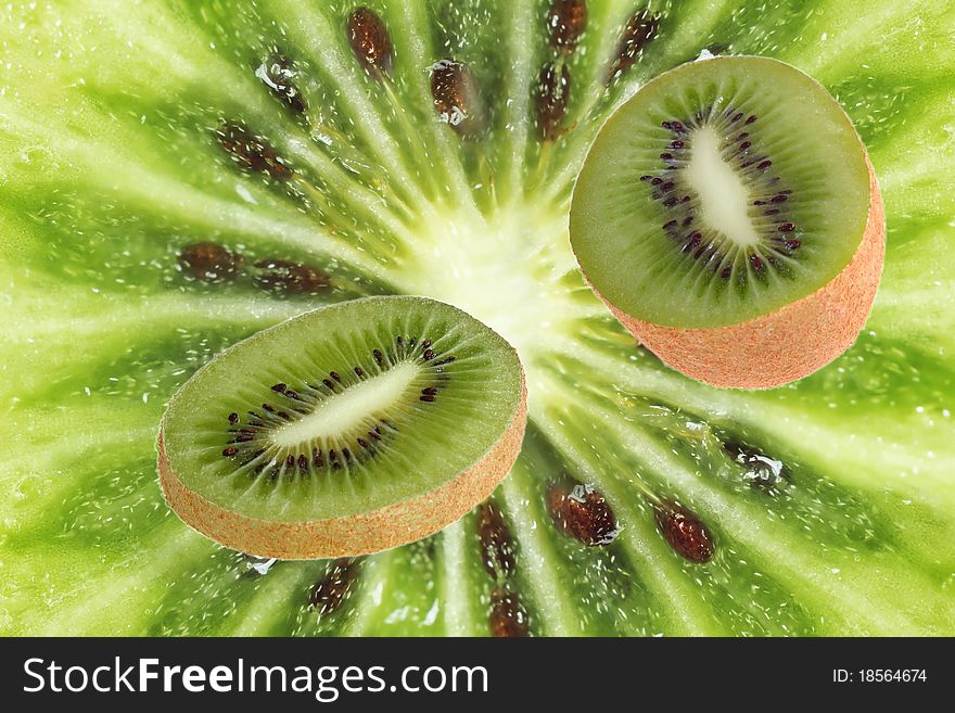 Part of fruit of a kiwi against a close up. Part of fruit of a kiwi against a close up