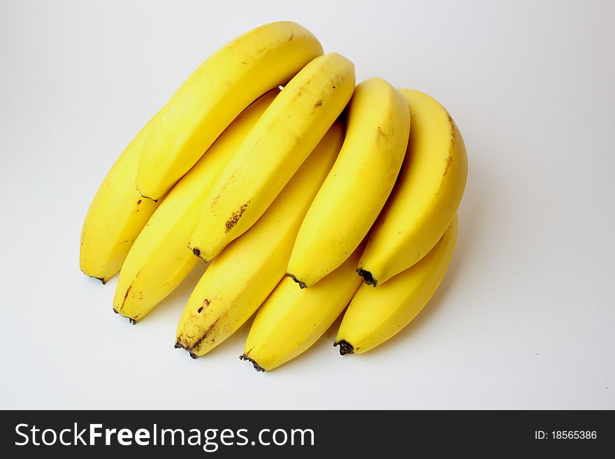 Yellow bananas on white background. Yellow bananas on white background