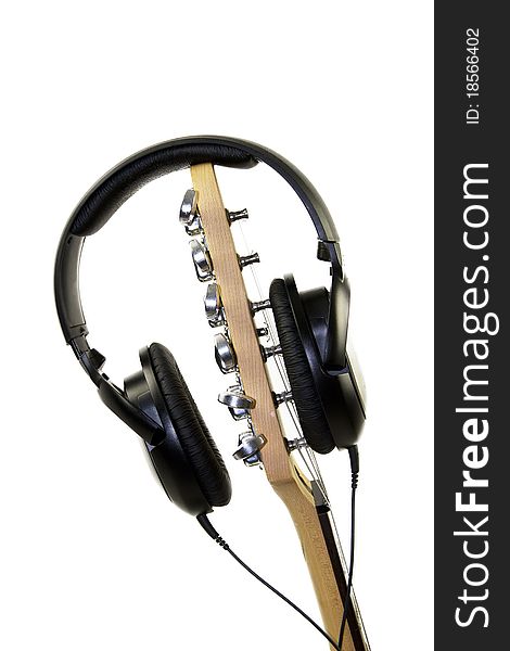 Guitar with Headphones on white Background isolated