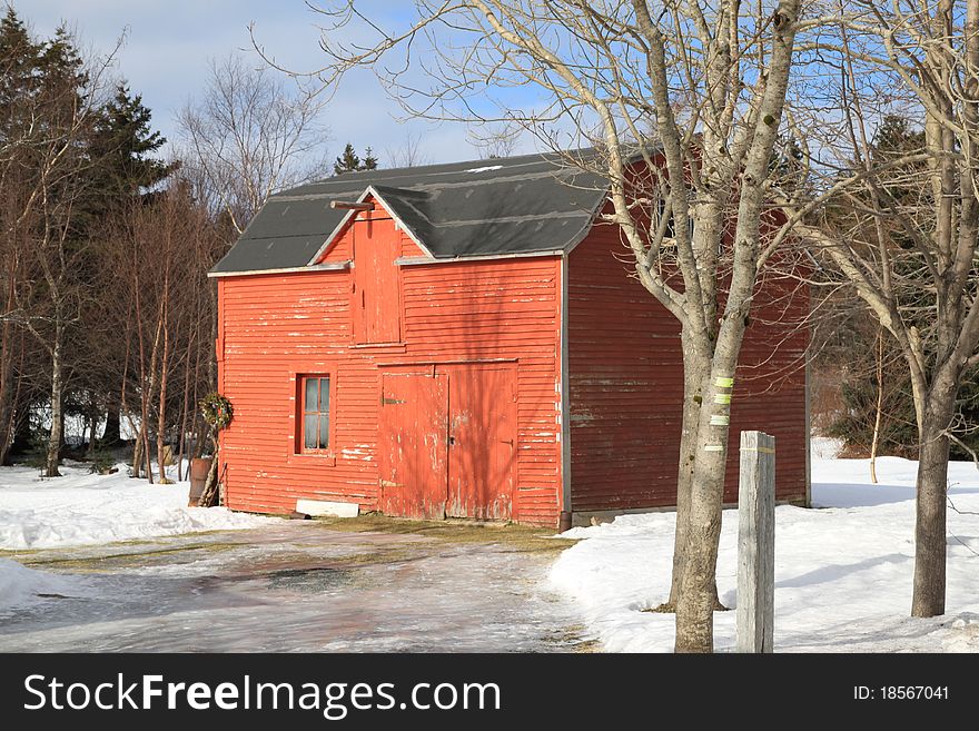 Old red barn in winter