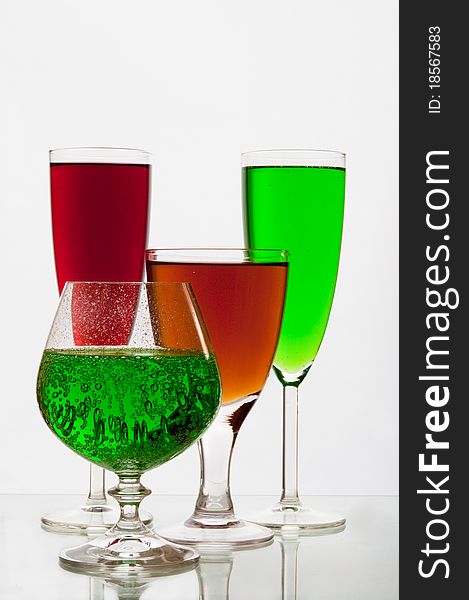 Lemonade in glasses of green, red color