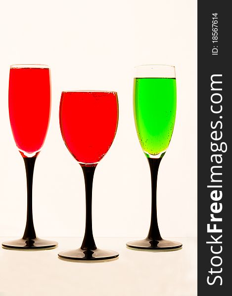 Lemonade in glasses of green, red color