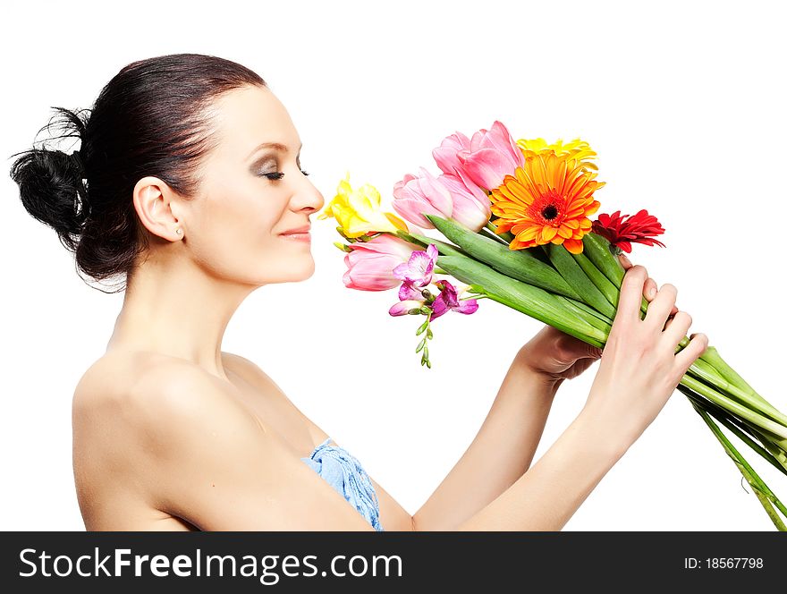 Portrait of beautiful woman with flowers on white background