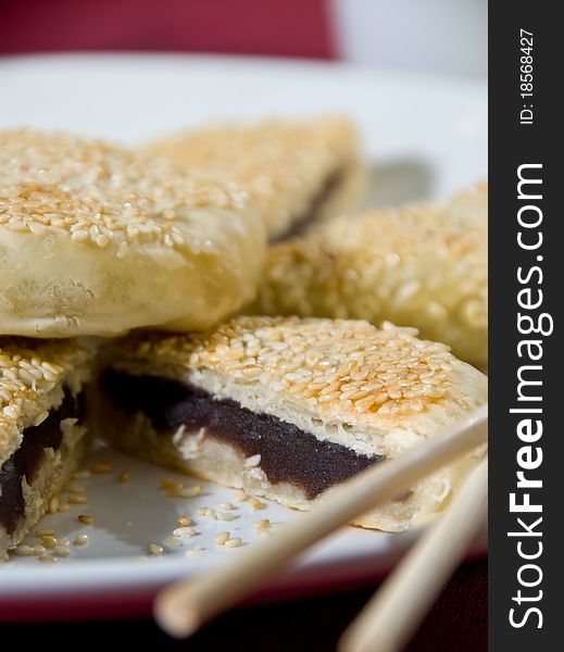 Steamed buns with bean curd and sesame seed