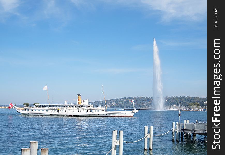 Boat and The Jet d'Eau (Water-Jet) is a large fountain in Geneva, Switzerland, and is one of the city's most famous landmarks. Boat and The Jet d'Eau (Water-Jet) is a large fountain in Geneva, Switzerland, and is one of the city's most famous landmarks.