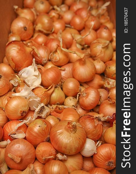 Onions and garlic in box