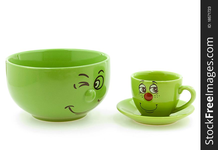 A Green Bowl Beside a Green Kid s Cup