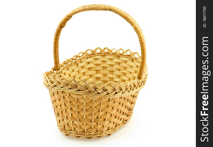 An empty wattled basket to put in anything on the white background