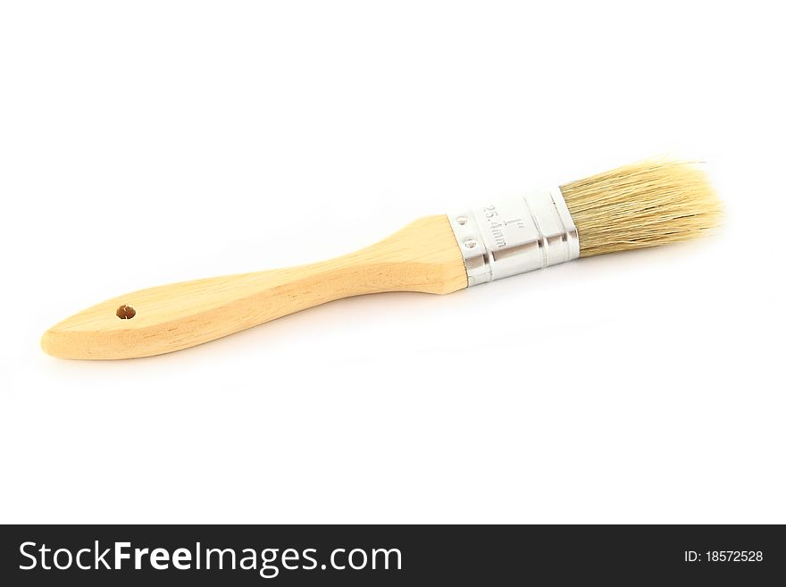 Wood brush for painting on food.