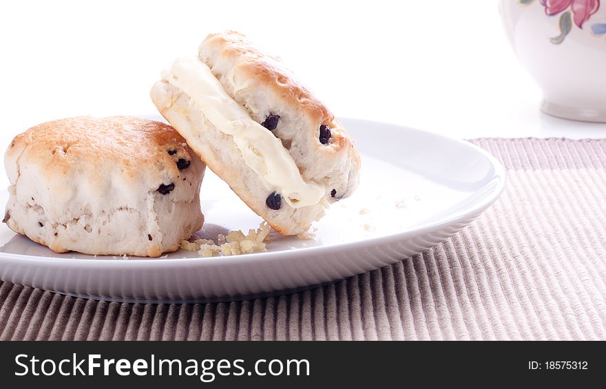 Delicious scones with thick clotted cream. Delicious scones with thick clotted cream