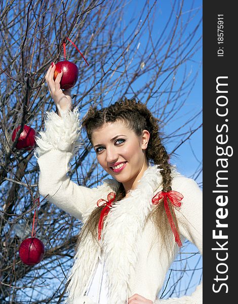 Smiling young woman with red apple. Smiling young woman with red apple