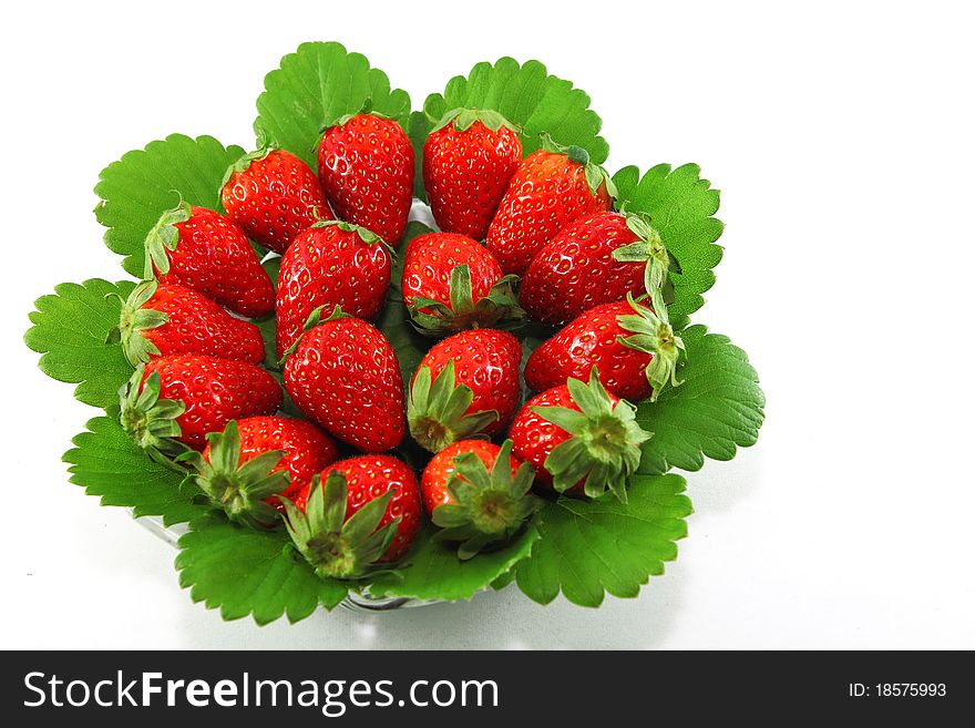 Strawberries and leave on  white background. Strawberries and leave on  white background