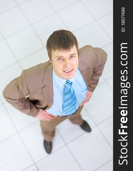 Happy businessman standing