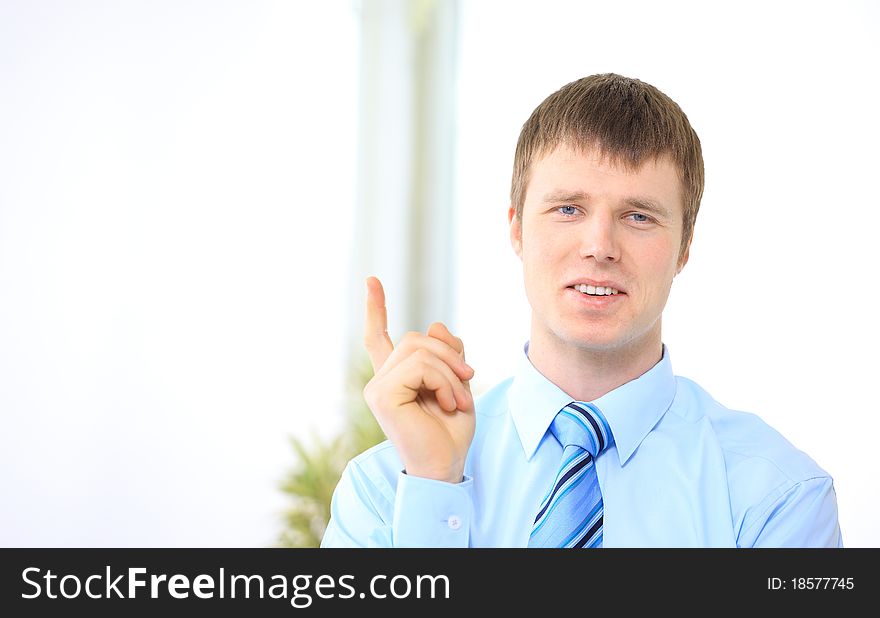 Portrait of successful businessman at office