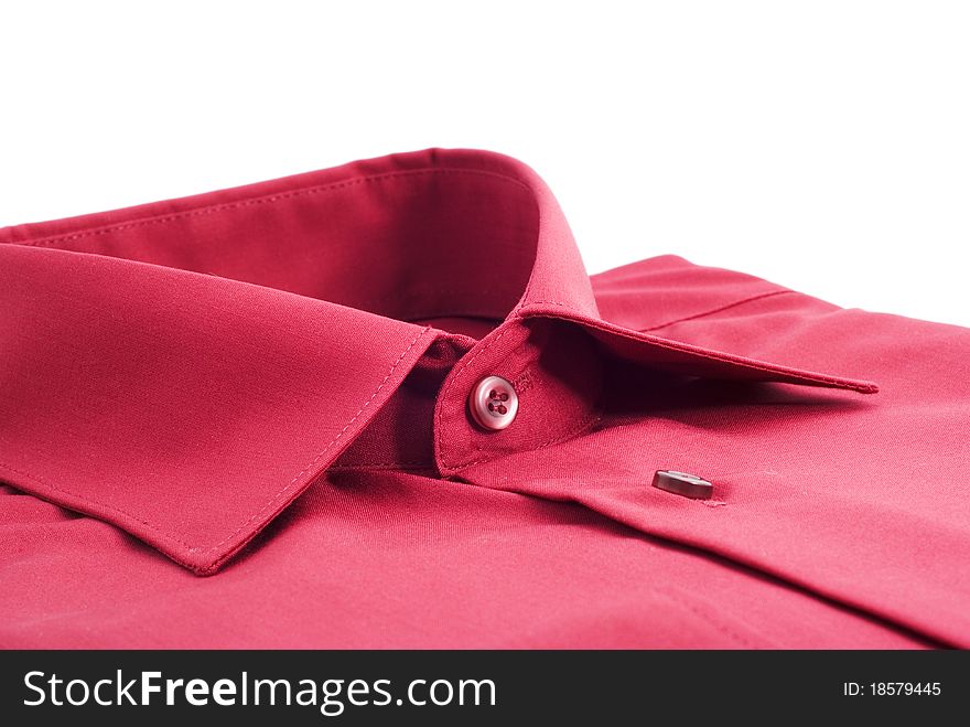 Fastened red shirt on a white background