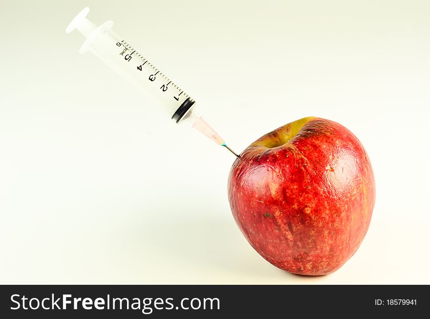 Apple And Syringe Isolate on white background