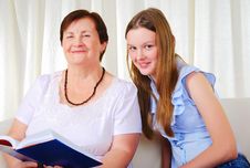 A Grandmother With Her Young Granddaughter Stock Image