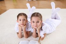 Twin Sisters Together At Home With Books Stock Photography Twin Sisters Together At Home With Books Stock Photography