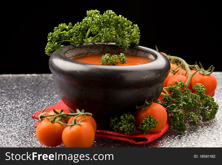 Photo of delicious tomatoe sauce with parsley on red cloth