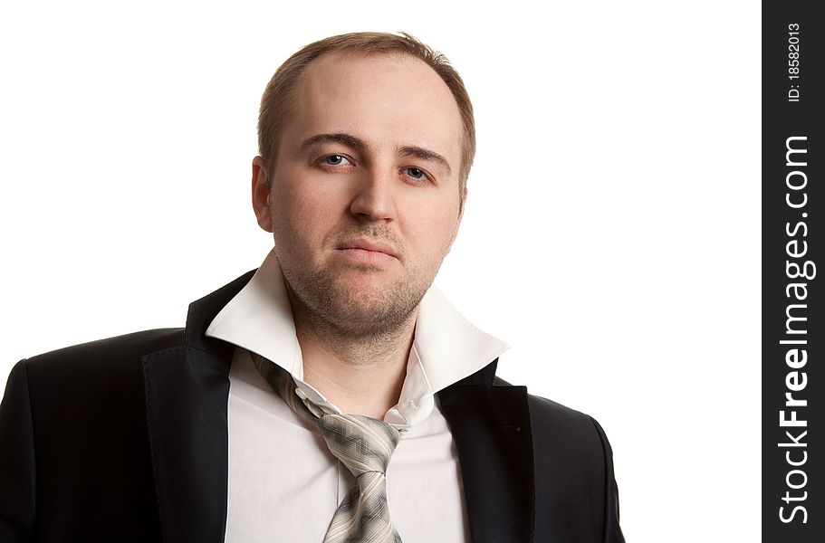 Disheveled businessman with unleashed a tie on a white background