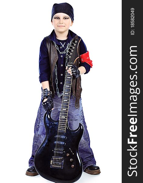 Shot of a little boy playing rock music with electric guitar. Isolated over white background. Shot of a little boy playing rock music with electric guitar. Isolated over white background.