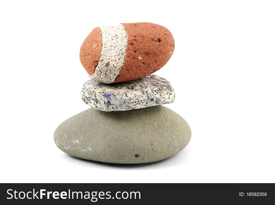 Three rocks stacked on top of each other. Three rocks stacked on top of each other