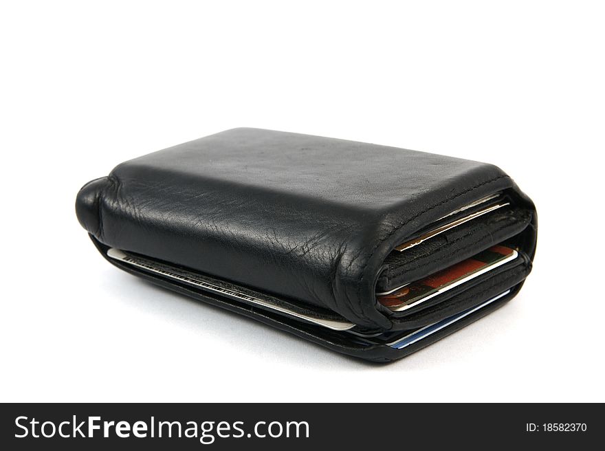 Black wallet full of cash and credit cards