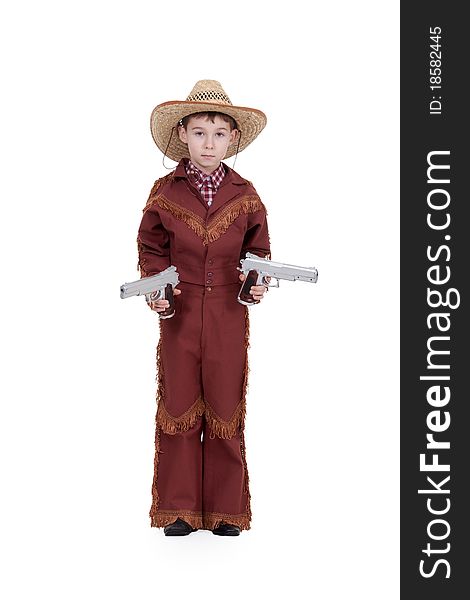 Boy dressed as a cowboy with pistols on a white background