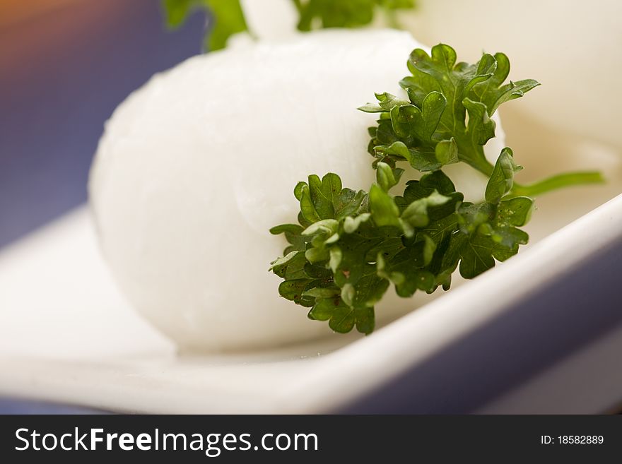 Photo of delicious mozzarella cheese with parsley