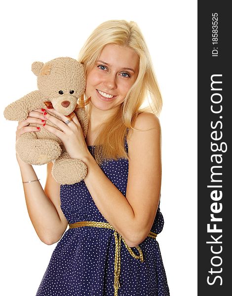 Young attractive woman holding in the arms of Teddy.  Isolated on white. Young attractive woman holding in the arms of Teddy.  Isolated on white