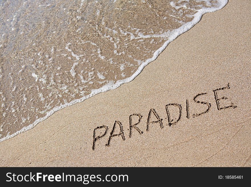 Paradise written on the sand. Paradise written on the sand