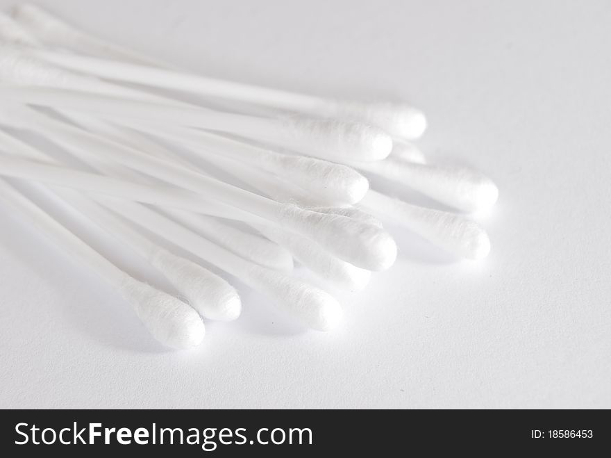 Cotton buds on white background. Cotton buds on white background