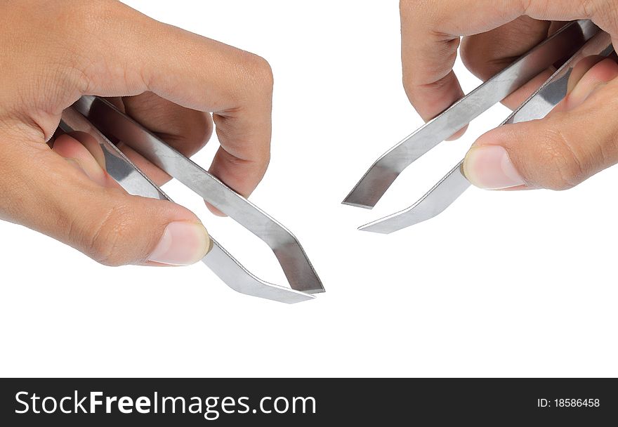 Hand using stainless pincer or pincette. wide open and close. isolated over white background. Hand using stainless pincer or pincette. wide open and close. isolated over white background