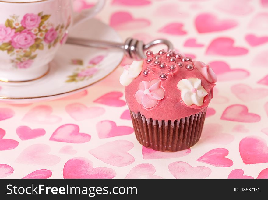 Cup cake and tea cup