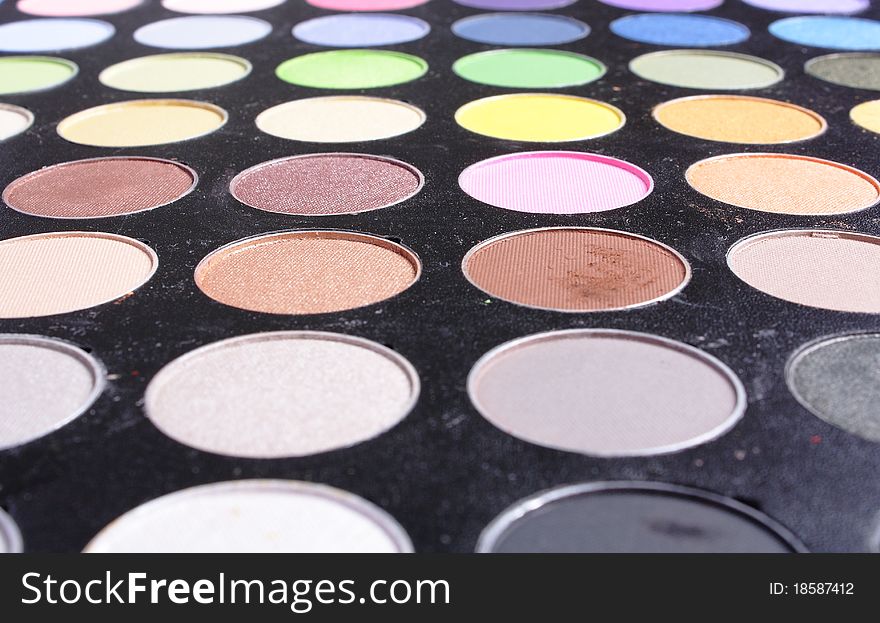 Make-up cosmetics on white background (still-life)