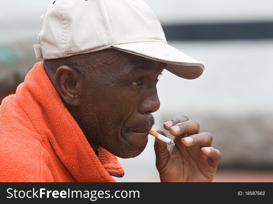 Elderly African American Man Smoking
