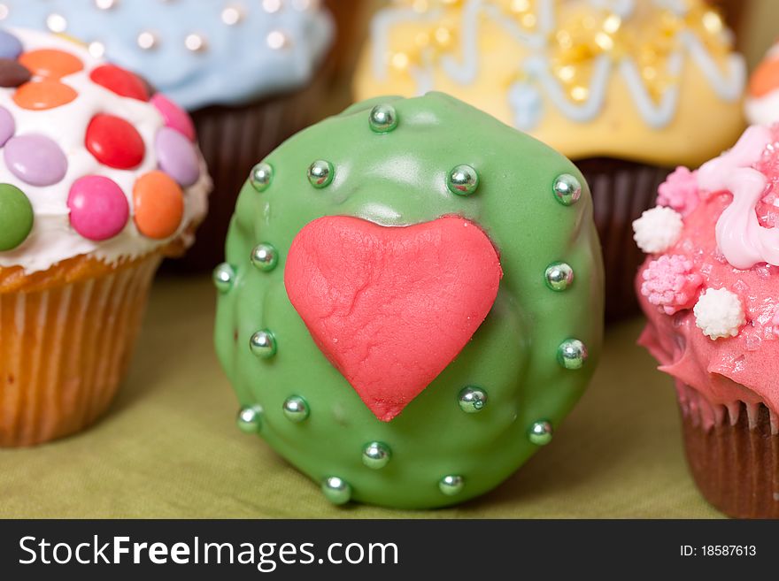 Macro picture of multi coloured cup cakes