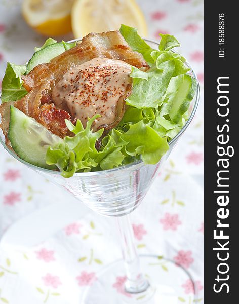 Bacon and lettuce cocktail with zingy mustard dressing in a martini glass