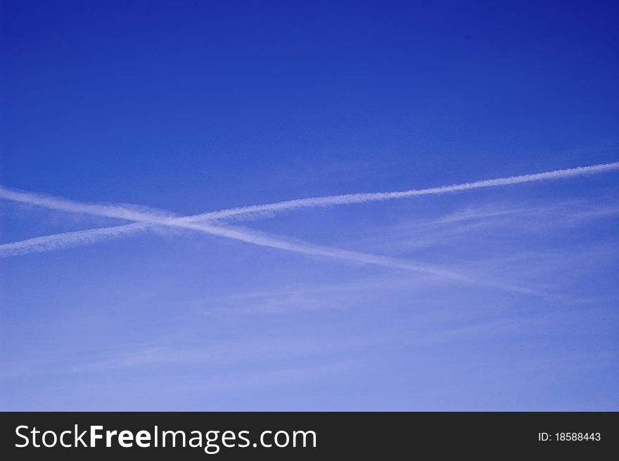 White airplane trace sky background