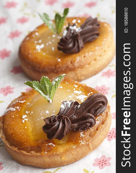 Delicious mini chocolate and pear tarts with mint