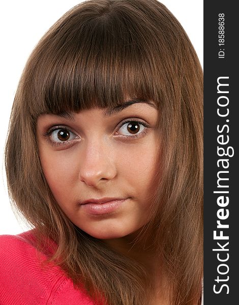 Portrait of the brunette in a red sweater isolated on a white background