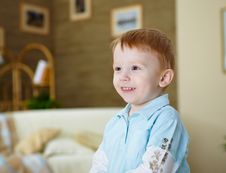 Happy Smiling And Laughing Boy At Home Royalty Free Stock Photography