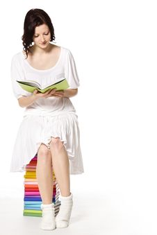 Girl On Book Stack Reading. Royalty Free Stock Photography Girl On Book Stack Reading. Royalty Free Stock Photography