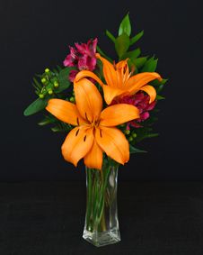 Orange, Magenta And Green Bouquet On Black Royalty Free Stock Photo